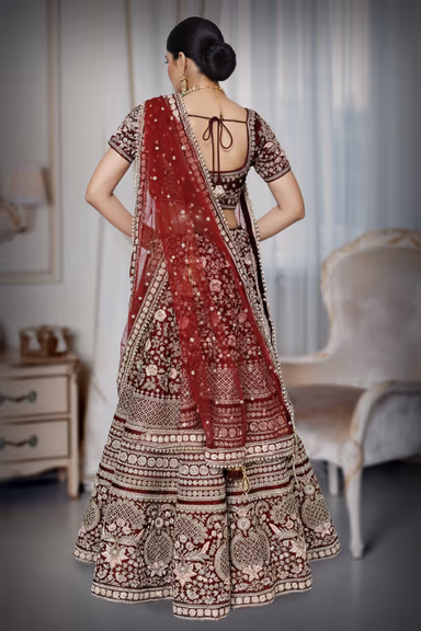 Wine with heavy Zari work lehenga — view 3 of 4