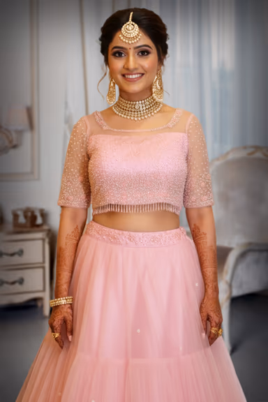 Baby Pink Layered Net Lehenga with Pearl and Sequins Embellishments — view 1 of 3