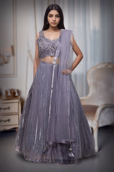 Dark Lavender Pre Wedding Lehenga With Uniform Stone Worked Skirt, Exquisite Stoneworked Crop Top Along With… — view 1 of 2