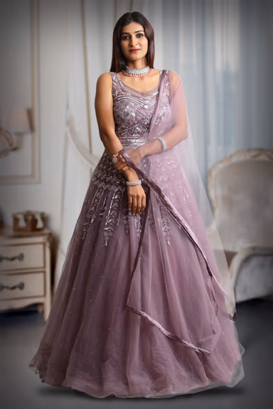 Dark mauve colour gown with heavy stone work as extension from the yoke — view 2 of 5