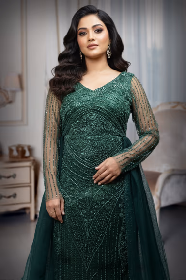 Deep Emerald Green Heavily Embellished Gown with Full Sleeves and Over-Skirt Detail — view 1 of 6
