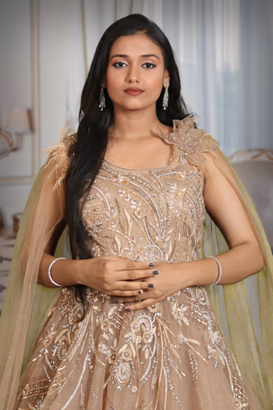 Light brown glitter net trail sleeve gown — view 1 of 5