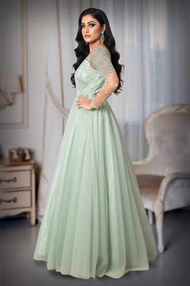 Light Mint Green Gown With Beaded Embellishments Sheer Sleeves And Flowing Tulle Skirt Excellent For An… — view 3 of 5