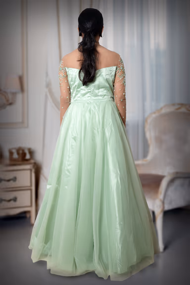 Light Mint Green Gown With Beaded Embellishments Sheer Sleeves And Flowing Tulle Skirt Excellent For An… — view 4 of 5
