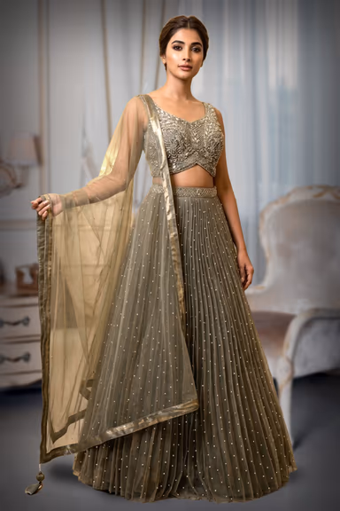Light Olive Green Pre Wedding Lehenga With Uniform Stone Worked Skirt, Exquisite Stoneworked Crop Top Along… — view 2 of 2