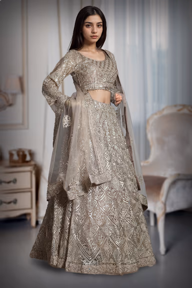 Metallic Golden Heavy Stone Worked Net Lehenga With Heavy Detailed Crop Top And Same Color Dupatta — view 3 of 3