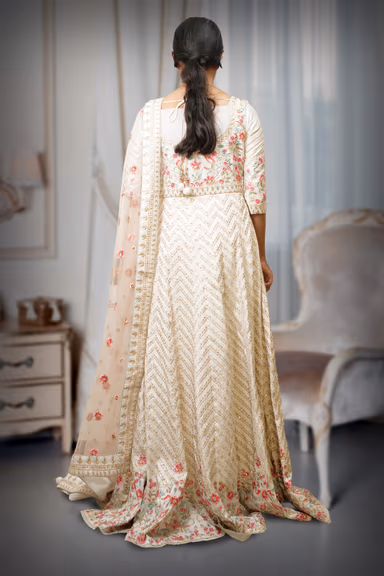 Off White Gown Features Floral Details, Creating A Graceful And Luxurious Appearance — view 4 of 4