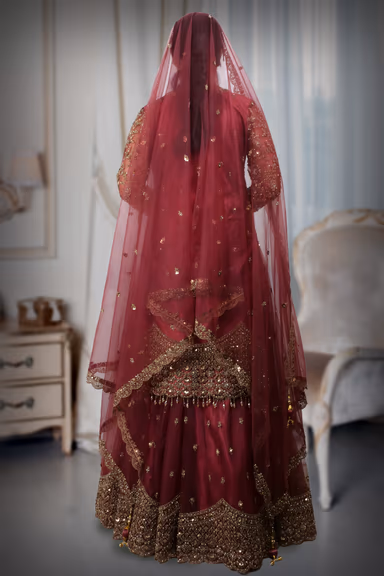 Radiant Gold Patterns Beautifully Contrast Against The Elegant Dark Mauve Fabric Of This Lehenga — view 7 of 7