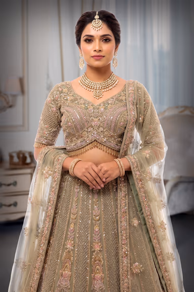 Intricate Hand-Embroidered Sage Green Lehenga Choli with Sequined Net Dupatta — view 1 of 3