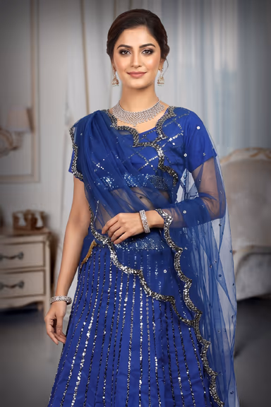 Navy Blue Faux Lehenga With Heavy Sequins And A Well Detailed Border Which Comes With A Detailed Blouse And… — view 1 of 3