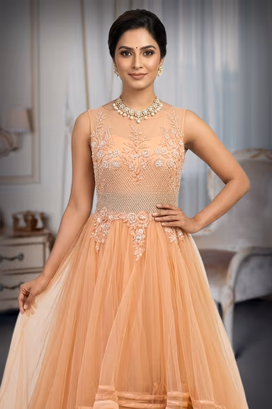Pastel Peach Net Gown with 3D Floral Appliqué and Tiered Ruffles — view 1 of 2