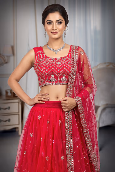 Rani pink Net Lehenga With Minimal Mirror Work Detailing With Sleeveless Blouse And Same Colour Dupatta — view 1 of 3