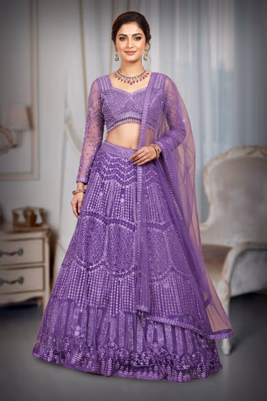 Regal Purple Net Lehenga With Stone Work Details And Raindrop Beads Detailing In Waist Line With Same Color… — view 2 of 4