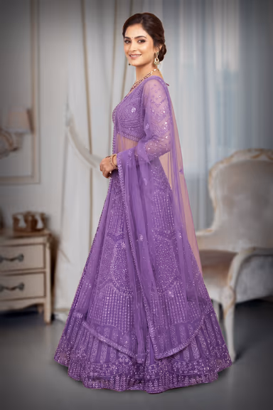 Regal Purple Net Lehenga With Stone Work Details And Raindrop Beads Detailing In Waist Line With Same Color… — view 3 of 4