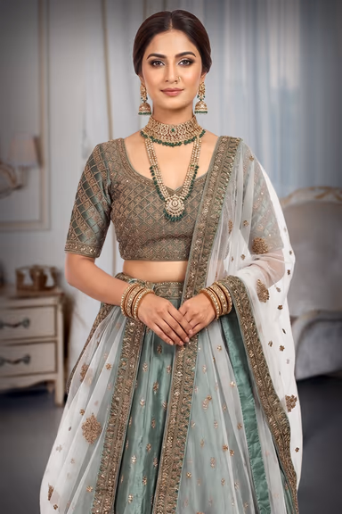 Sage Green Velvet Lehenga With Golden Geometric Embroidered Net Design — view 1 of 3
