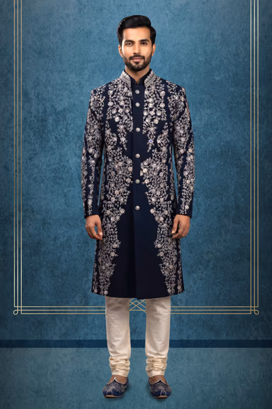 Shine Bright At Any Special Event In This Opulent Navy Blue Sherwani Beautifully Highlighted With Silver… — view 1 of 3