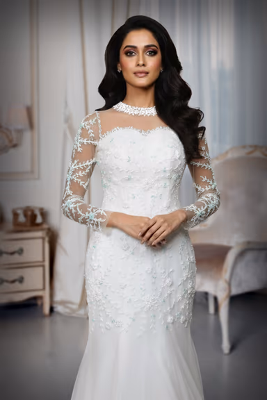 Elegant White Illusion Neckline Mermaid Gown with Floral Lace Appliqués and Tulle Train — view 1 of 2