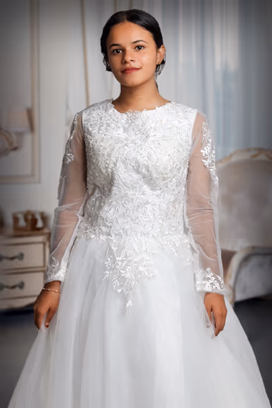 White Bridal Gown With Heavy Lacework Details On Front And Back Yoke Along With Sleeves — view 1 of 4