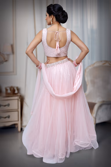 Baby pink lehenga with heavy crystal blouse with random sequence work. — view 4 of 4