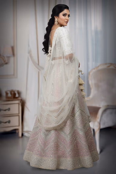 Elegant beige and pink lehenga, blazes with intricate embroidery and shimmering sequins — view 4 of 4