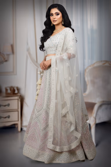 Elegant beige and pink lehenga, blazes with intricate embroidery and shimmering sequins — view 3 of 4