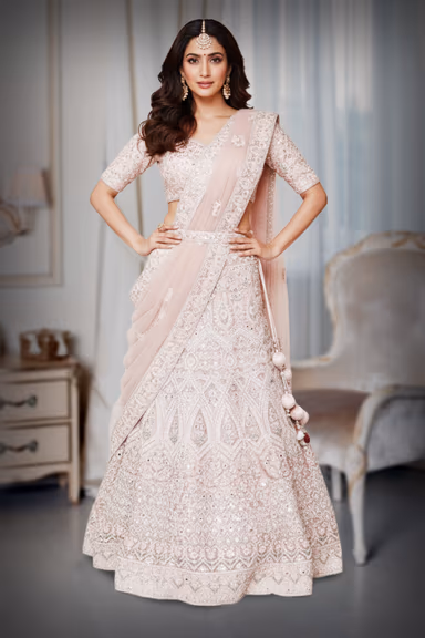 Blush Pink Heavy Embroidered Designer Net Lehenga Choli with Matching Soft Net Dupatta — view 2 of 3