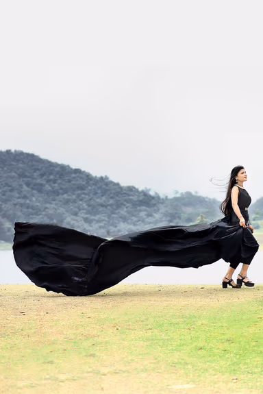 Black Satin Sleeveless Gown With Minimal Yoke And Flarey Back Tail — view 2 of 4