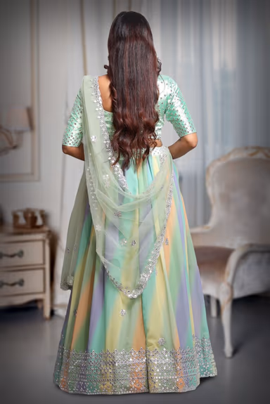 Mint Green Georgette lehenga With Heavy Detailed Deepcut blouse and Vibrant Ombre colour Shade Skirt And… — view 5 of 5