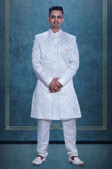 White Two Piece Sherwani With Threadwork Detailed Outer Jacket And Front Closed Inner Kurtha — view 1 of 3