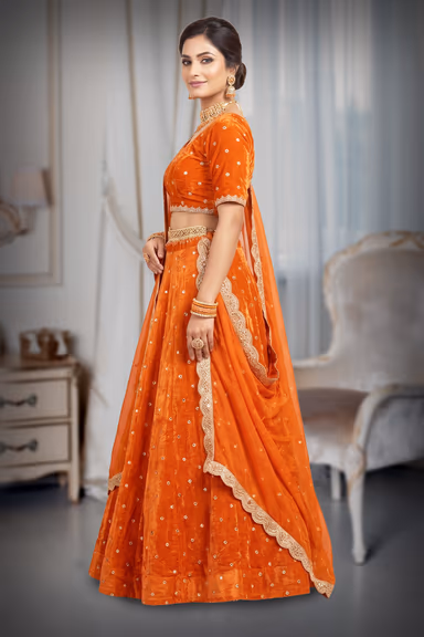 Vibrant Rust Orange Velvet & Silk-Blend Lehenga Choli Set with Mirror-Embellished Dupatta — view 3 of 3