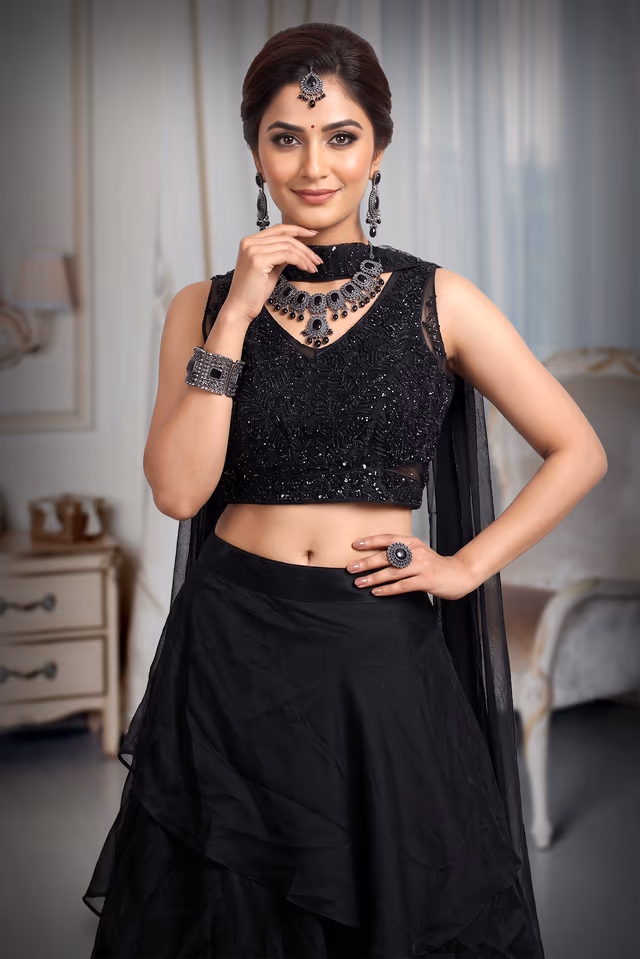 Black Multilayered Pre Wedding Lehenga With Stone Work Detailed Crop Top And Same Color Dupatta — rent in Kochi