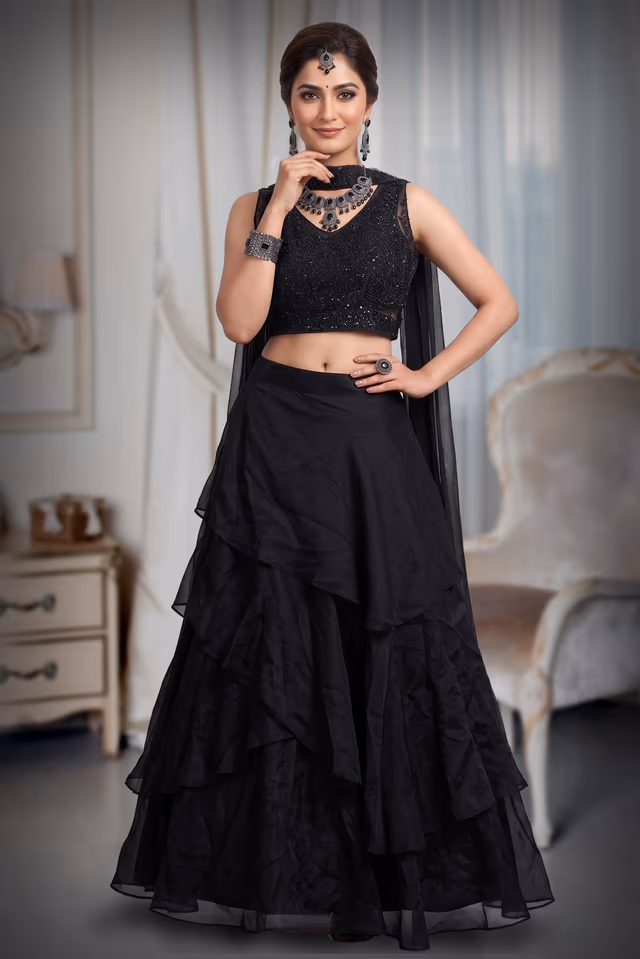 Black Multilayered Pre Wedding Lehenga With Stone Work Detailed Crop Top And Same Color Dupatta — back view, rent in Kochi