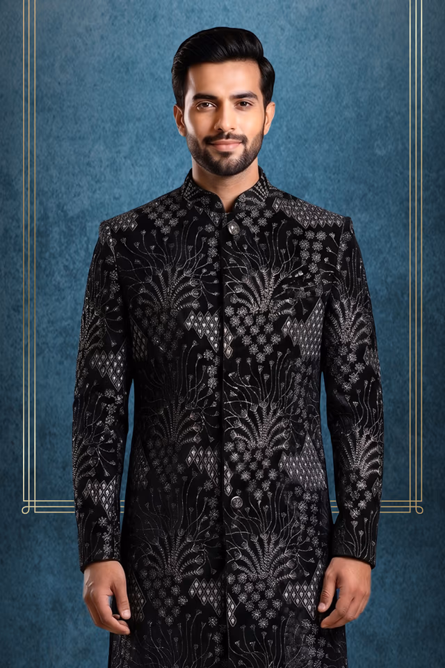 Luxurious Black Velvet Sherwani Showcasing Majestic Silver Geometric And Floral Embroidery… — back view, rent in Calicut