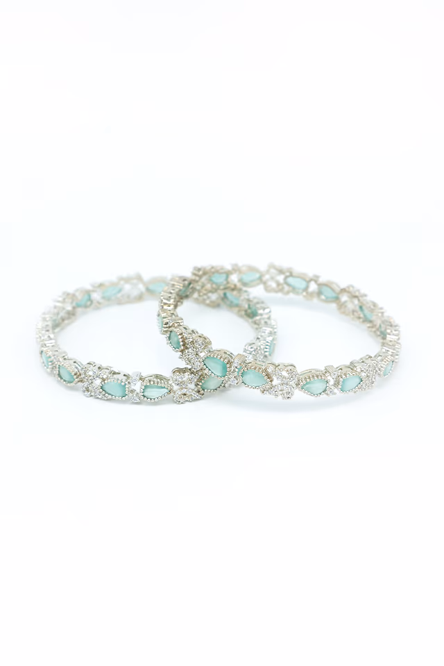 Beautifully Designed Silver Bangles Featuring High Quality Mint Green Stones For A Sophisticated And… — rent in Calicut
