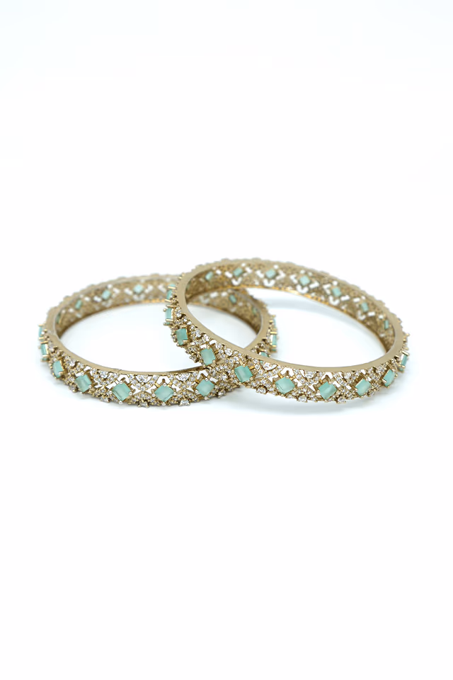 Celebrate Special Occasions With These Radiant Silver Toned Bangles Featuring Light Green Gemstones And… — rent in Calicut