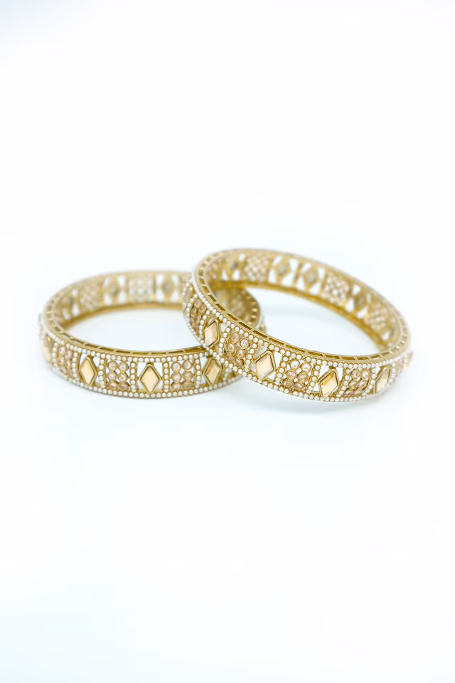 Elegant Circular Stone Bangles Are A Versatile Addition To Any Jewelry Collection Providing Timeless… — rent in Calicut