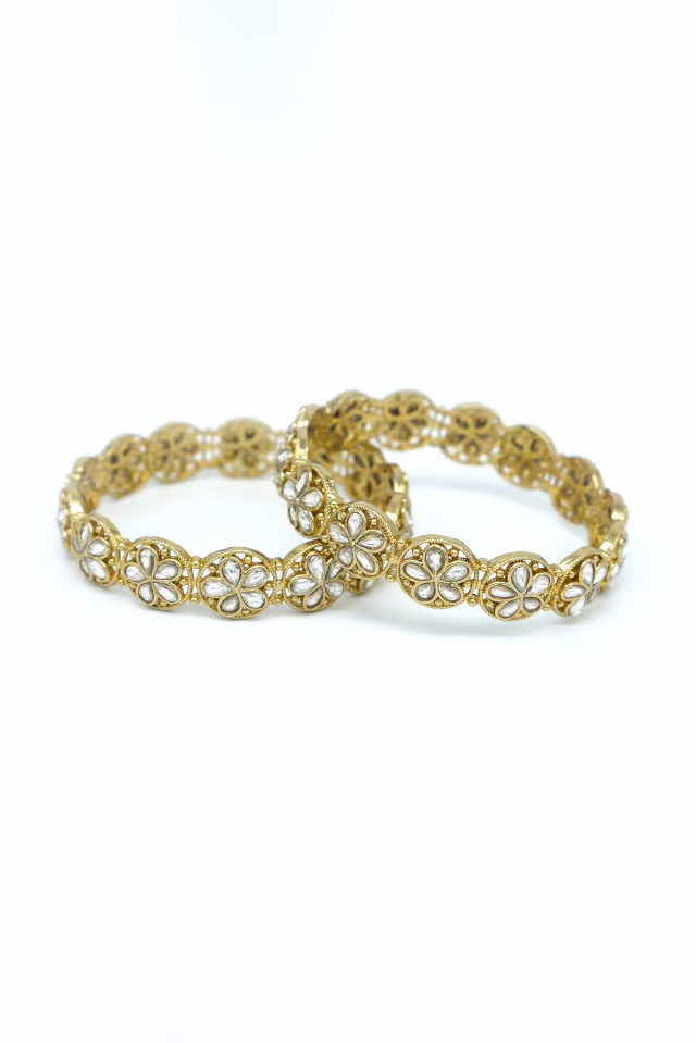 Elevate Your Occasion Wear With These Golden Bangles Set With Brilliant Clear Stones For A Truly High End… — rent in Calicut