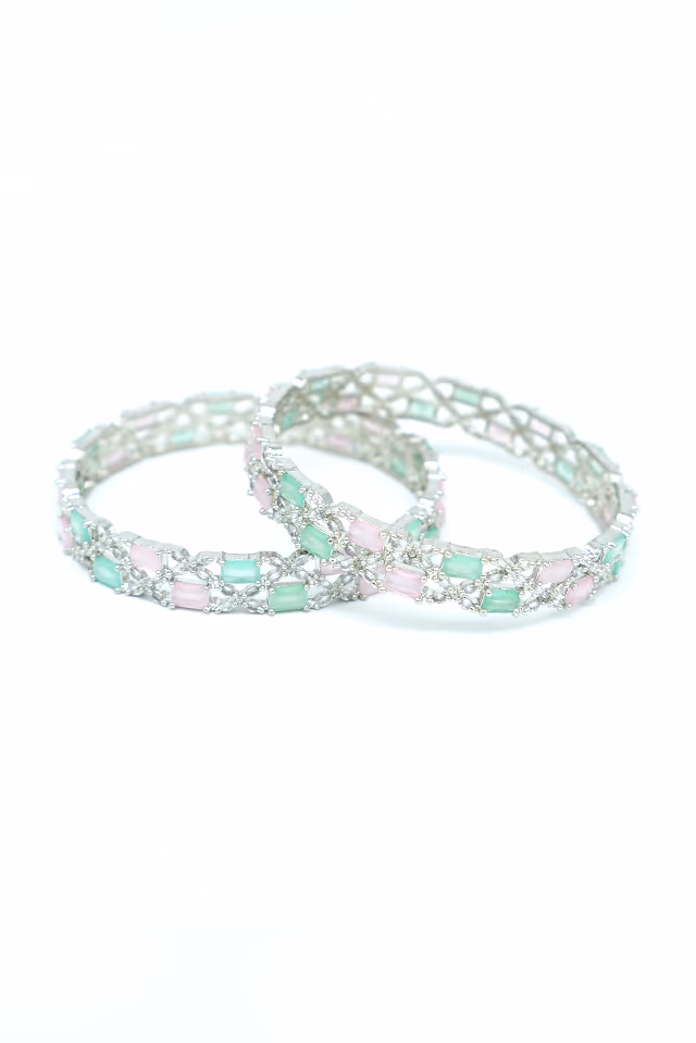 These Exquisite Bangles Offer A Perfect Blend Of Classic Green And Pink Tones And Modern Silver Shine — rent in Calicut