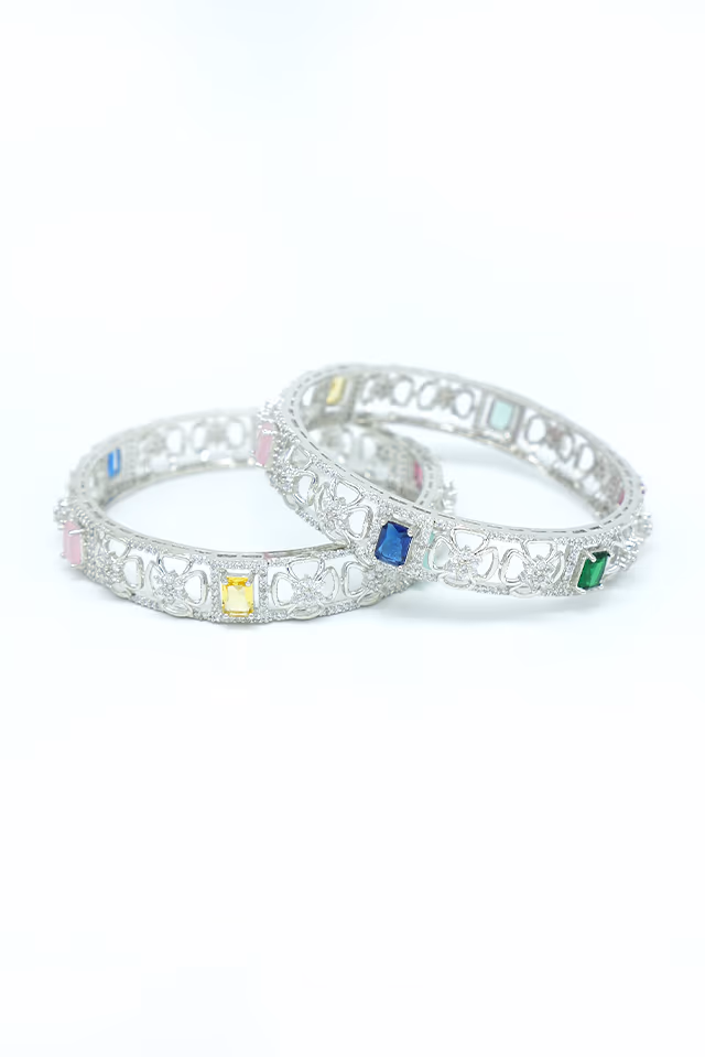 These Exquisite Bangles Offer A Perfect Blend Of Classic Multicolor Tones And Modern Silver Shine — rent in Calicut