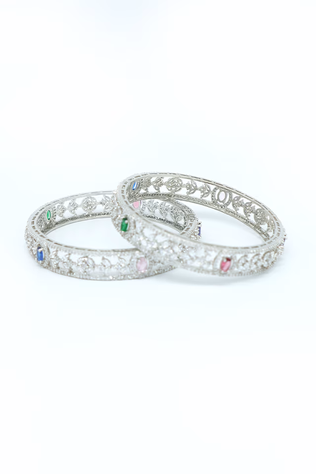 Shine Bright At Every Party With These Stunning Silver Toned Bangles Adorned With Brilliant Blue And… — rent in Calicut