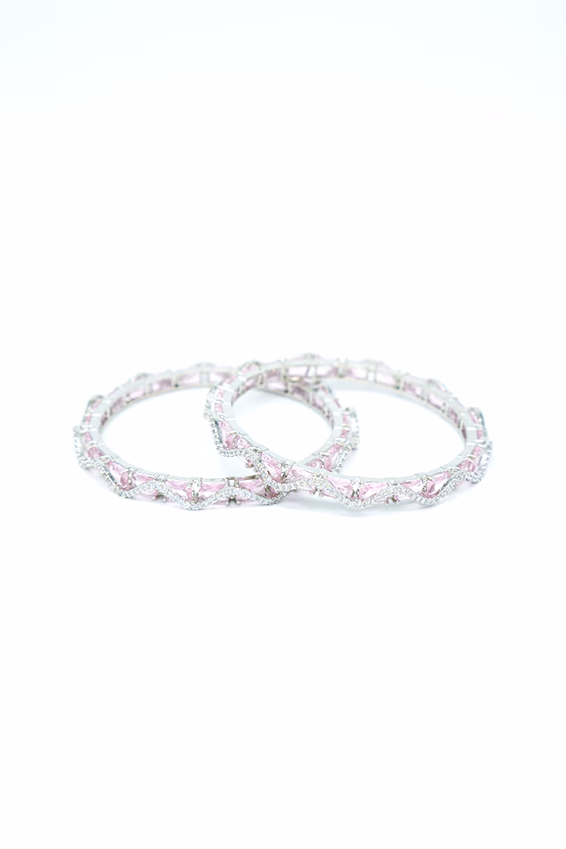 Sophisticated Silver Plated Bangles Decorated With Vibrant Pink Oval Gems And Dazzling Clear Stone… — rent in Calicut