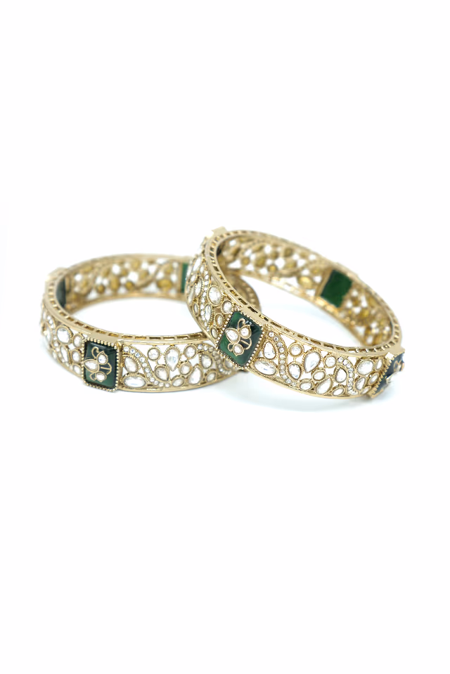 Sparkle With Tradition In These Exquisite Gold Toned Bangles Featuring Beautiful Circular Floral Clusters… — rent in Calicut