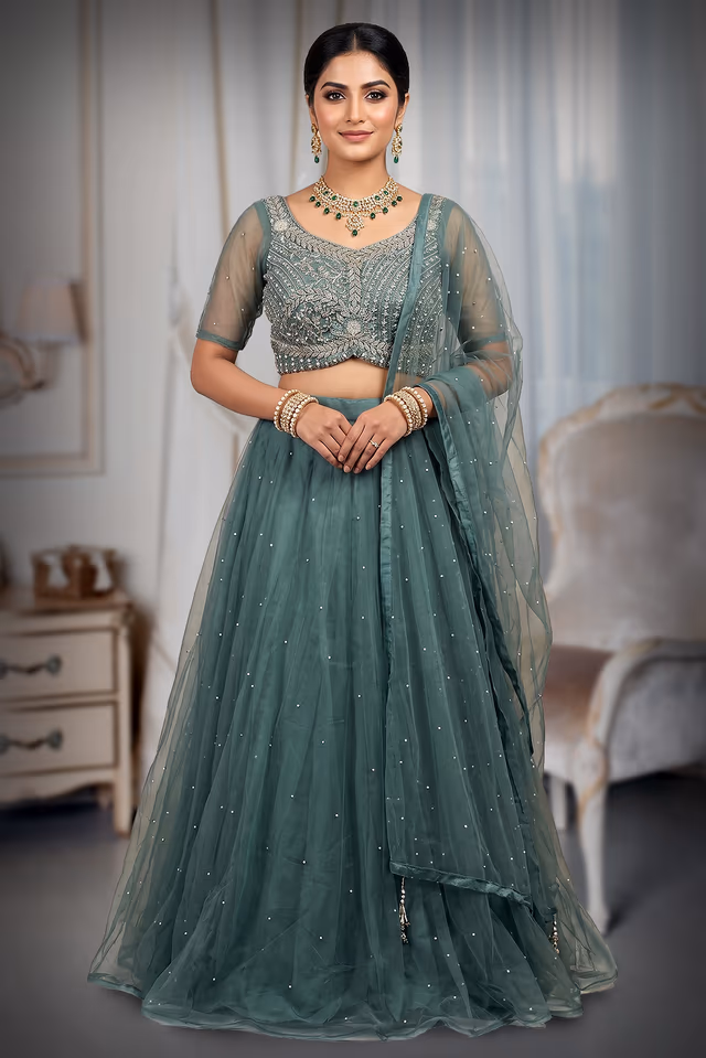 "Beautiful Sage Green Net Lehenga With Pearl Embellishments And Matching Blouse For Modern… — back view, rent in Calicut