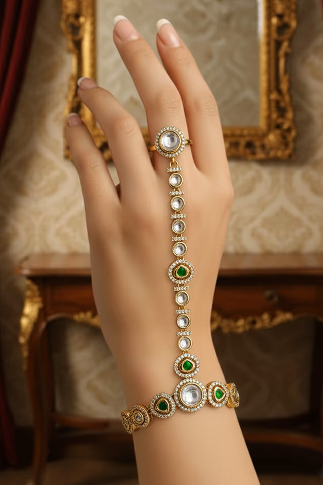 Beautifully Designed Gold Chain Bracelet Linked To A Statement Ring Featuring Classic Indian Floral… — rent in Calicut
