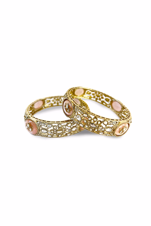 Baby Pink central oval motif acts as a striking focal point, surrounded by delicate floral patterns and… — rent in Bangalore