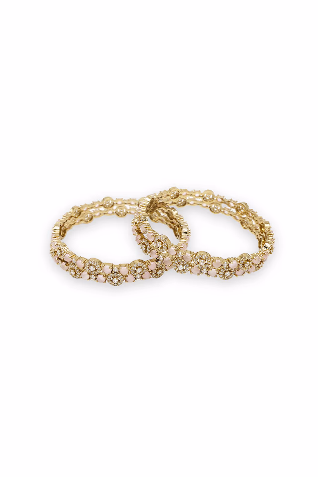 Perfect For Special Occasions These Delicate White And Pink Stone Bangles Offer A Luxurious Shine And A… — rent in Calicut
