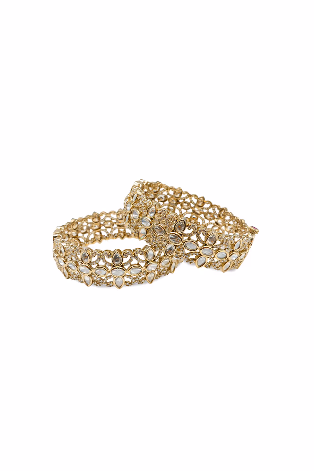 Stunning Set Of Kundan Bangles Showcasing Large Oval Uncut Polki Stones With Shimmering AD Crystal… — rent in Coimbatore