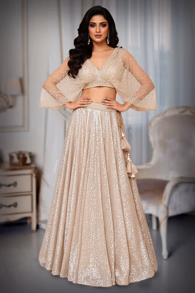 Pearl work with a sequencedskirt creating a gather sleeves. — back view, rent in Bangalore