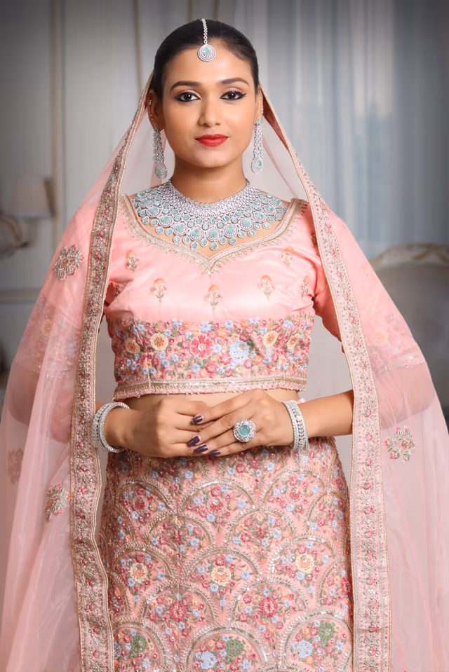 Pink multi color embroidery work lehenga — rent in Calicut