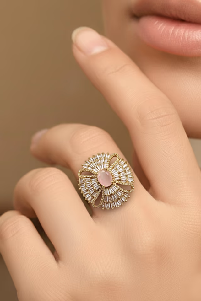 Magnificent Gold Toned Pink Stone Radial Designer Ring — rent in Coimbatore